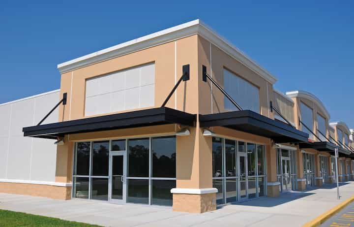 Bright red commercial awning in Shreveport, LA.